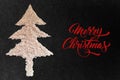 White sesame seed christmas Tree designed on black granite texture background top view Royalty Free Stock Photo