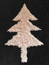 White sesame seed christmas Tree designed on black granite texture background top view Royalty Free Stock Photo