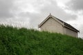 White shed on top of