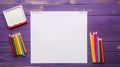 white sheet of paper and a set of colorful pencils Royalty Free Stock Photo