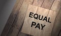 sheet of paper with the text EQUAL PAY. Gender equality concept Royalty Free Stock Photo