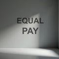 white sheet of paper with the text EQUAL PAY. Gender equality concept Royalty Free Stock Photo
