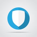 White shield in flat design with long shadow. Simple shield icon on a blue circle. Vector illustration.