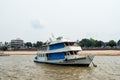 White ship at anchor on river in Santarem, Brazil