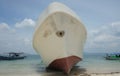A white ship is being repaired on the shore Royalty Free Stock Photo
