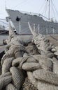 The ship is at the pier, moored to the pier. Kaliningrad. Ropes. Royalty Free Stock Photo