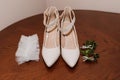 White shoes, groom's boutonniere. Bride's morning, wedding accessories Royalty Free Stock Photo