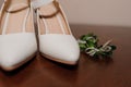 White shoes, groom's boutonniere. Bride's morning, wedding accessories Royalty Free Stock Photo