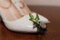 White shoes, groom's boutonniere. Bride's morning, wedding accessories Royalty Free Stock Photo