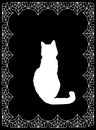 White silhouette of cat on black background framed Royalty Free Stock Photo