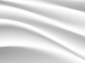 White silk cloth fabric wave overlapping with light and shadow. Royalty Free Stock Photo