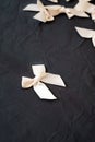 White silk ribbons isolated on the black background Royalty Free Stock Photo
