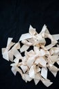 White silk ribbons isolated on the black background Royalty Free Stock Photo