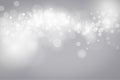 White and Silver glitter lights on bokeh abstract background. Royalty Free Stock Photo