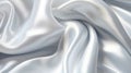 White silver silk satin fabric texture background with sweeping ripples and folds. Royalty Free Stock Photo