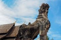 White Singha in blue sky at temple Royalty Free Stock Photo