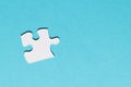 white single puzzle piece blue background. High quality photo Royalty Free Stock Photo