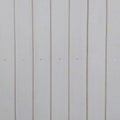 White slatted fence. The surface of the white slat fence. Building slat fence in the construction area