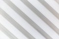 White slatted plastic wall panel. Modern trends in interior design. Space for text