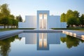 white sleek minimalist chapel surrounded by a serene pond