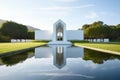 white sleek minimalist chapel surrounded by a serene pond