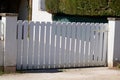 White slide classic home apartment door aluminum gate sliding slats portal garden entry of house Royalty Free Stock Photo