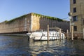 White small boat with motor and roof in the Gulf bay of Venice in blue sea water Royalty Free Stock Photo