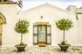 White small house in mediterranean city, Puglia, Italy Royalty Free Stock Photo