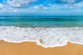 White small kindly waves on idillic sand beach