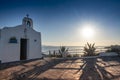 Typical greek place with a white small orthodox chapel dedicated to St Nikolaos.Rafina,Greece Royalty Free Stock Photo
