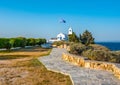 A  white small orthodox chapel dedicated to St.Nikolaos. Rafina,Greece. Royalty Free Stock Photo