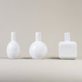 White small vases on gray background Royalty Free Stock Photo