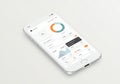 White smartphone displaying a finance or analytics app interface Royalty Free Stock Photo