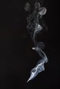 White smoke on black background