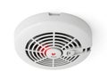 White smoke detector with red indicator light and test button isolated on white background Royalty Free Stock Photo