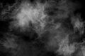 White smoke isolated on black background. Cloud in light. Misty cloud Royalty Free Stock Photo