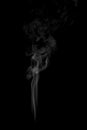 White smoke trickle texture on black background