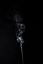 White smoky waves of aromastick Royalty Free Stock Photo