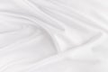 White smooth elegant silk or satin fabric texture with liquid wave.