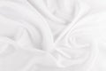 White smooth luxury silk abstract texture with liquid waves.