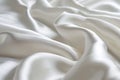 White smooth satin or silk texture background. White fabric abstract texture. Luxury satin cloth. Silky and wavy folds of silk