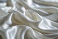 White smooth satin or silk texture background. White fabric abstract texture. Luxury satin cloth. Silky and wavy folds of silk
