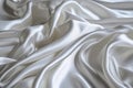 White smooth satin or silk texture background. White fabric abstract texture. Luxury satin cloth. Silky and wavy folds of silk Royalty Free Stock Photo