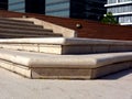 White smooth surfaced lime stone stair with rounded nosing