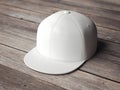 White snapback on the wooden floor. 3d rendering Royalty Free Stock Photo