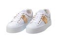 White sneaker isolated. Close-up of a pair white elegant stylish female leather high-heeled sport shoes isolated. Clipping path.