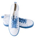 White sneakers with blue laces. Sports casual shoes isolated on white background.