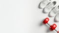 White Sneakers and Red Dumbbell for Fitness and Sport Workout Concept Royalty Free Stock Photo