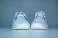 White sneakers for fitness and yoga on a light background close up Royalty Free Stock Photo