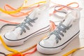 White sneakers with silver shoelaces